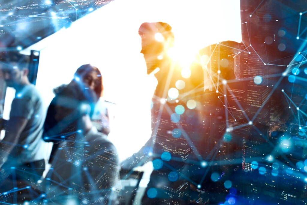 Équipe commerciale en collaboration — intégration de l'IA dans les pratiques de vente B2B